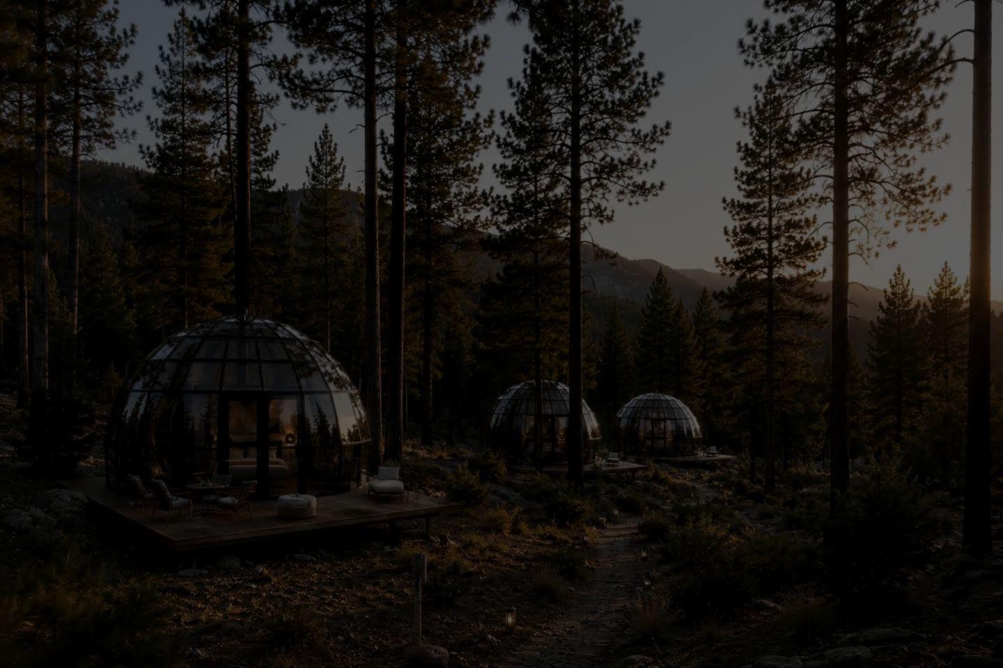 Several domes spaced out between the pines